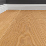 Detailaufnahme mit Sockelleisten Natur Parkett Emma Eiche Markant