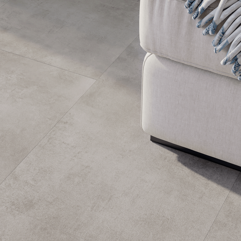 Sofa Closeup Klebe-Vinyl Beton Rheine dezentes Dekor in Fliesenoptik